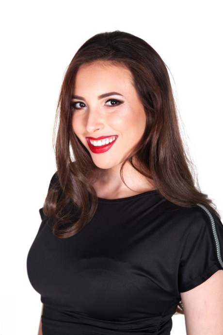 Beautiful brunette Casey Calvert sports red lips while getting naked in heels 50090016