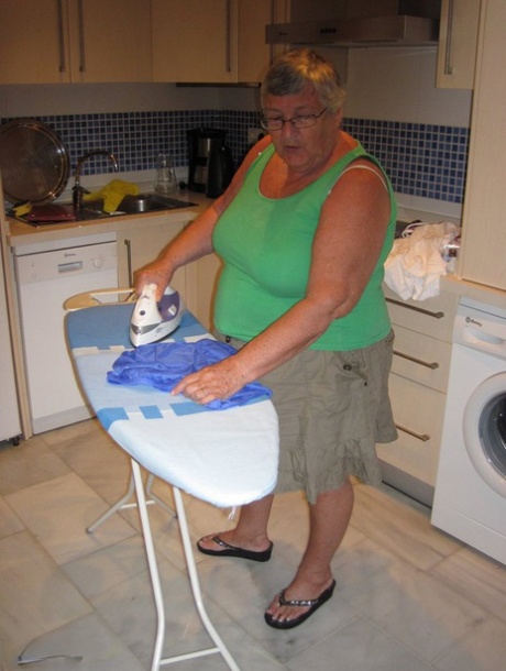 Overweight British oma Grandma Libby exposes her boobs while ironing 11608553