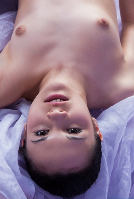 Beautiful brunette teen Ralina wears her hair up during a nude modelling gig 53508181