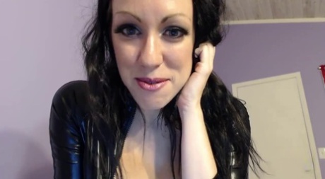 Beautiful Kayla Kiss in latex and boots teases with her round big tits 61157061