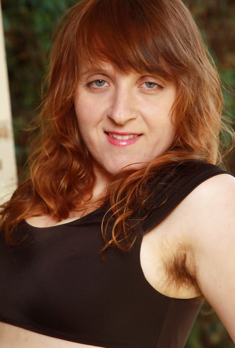 Ugly redhead woman Velma exposing her hirsute body outdoors 15927202